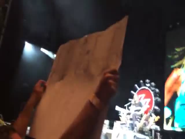 Dave Grohl Lets a Fan Play the Drums During a Live Concert