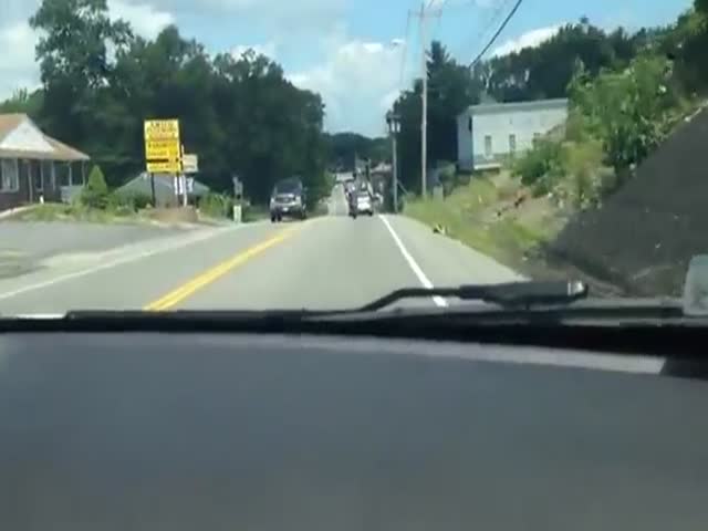 Motorcyclist Learns a Hard Lesson about Karma During a Fit of Road Rage
