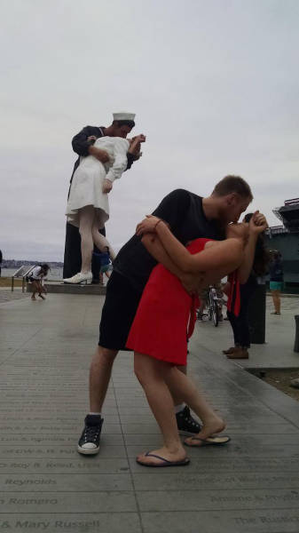 People Getting a Little Silly with Statues