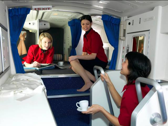 Inside the Airplane Bedrooms Where Flight Attendants Sleep on Long Flights