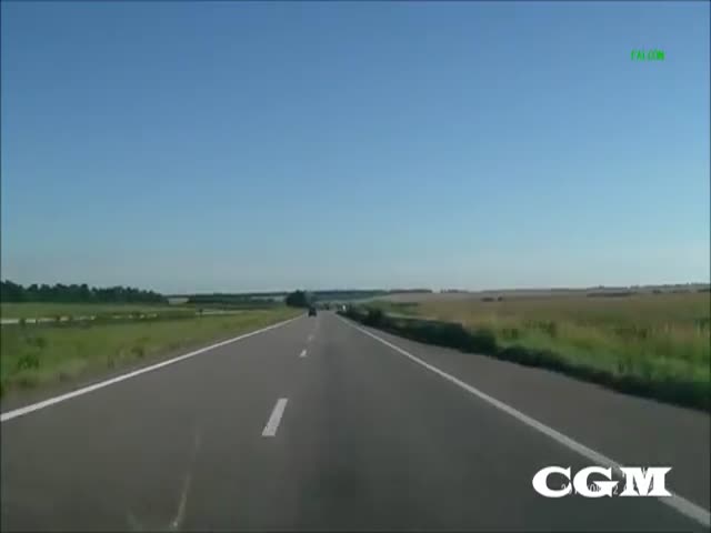 Helicopter Flies Really Low to the Ground Along a Highway in Ukraine