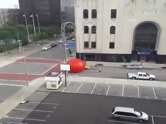 Giant Red Ball Escapes from Art Installation in Toledo