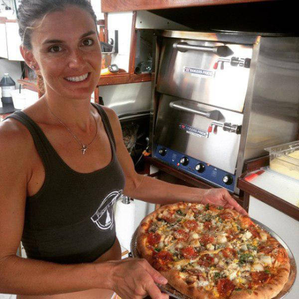 The Couple who Built a Floating Pizzeria in the Tropics