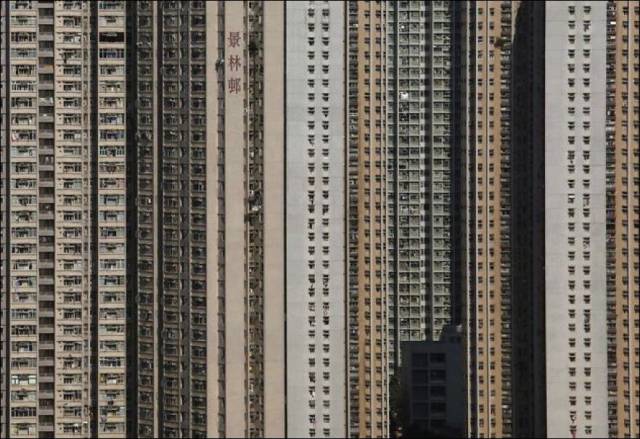 Towering Apartment Buildings Provide Tiny Cramped Accommodation for Residents in Hong Kong
