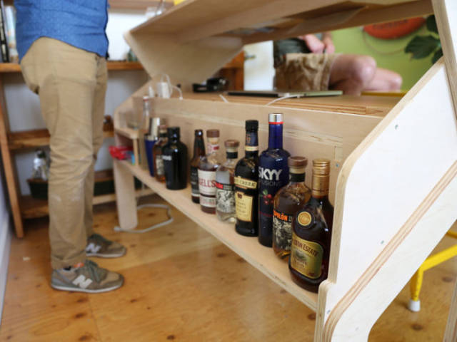 This Convertible Desk Bar Is the Coolest Piece of Furniture Ever