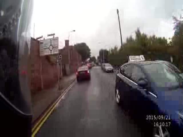 Irate British Driver Loses His Cool in a Heated Road Rage Episode