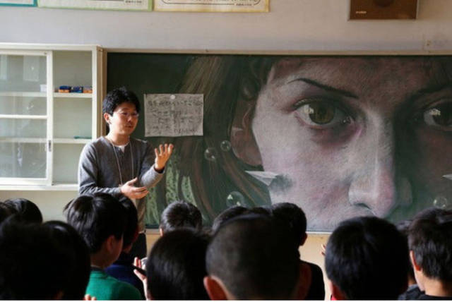 A Skilled Artist Uses His Classroom Chalkboard as a Constant Canvas