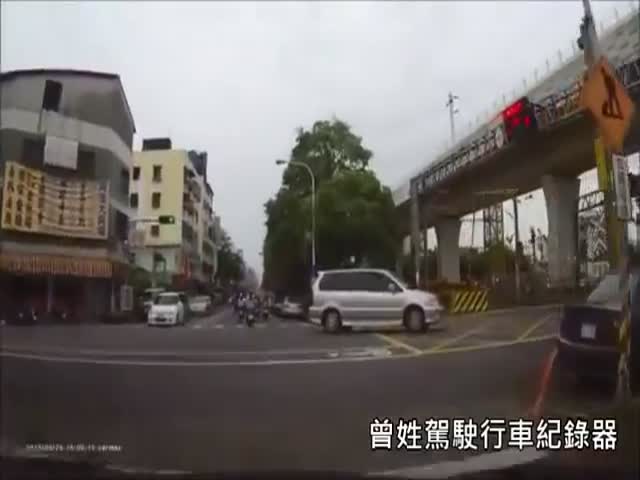 Train Surprises Everyone at a Taiwanese Railway Crossing