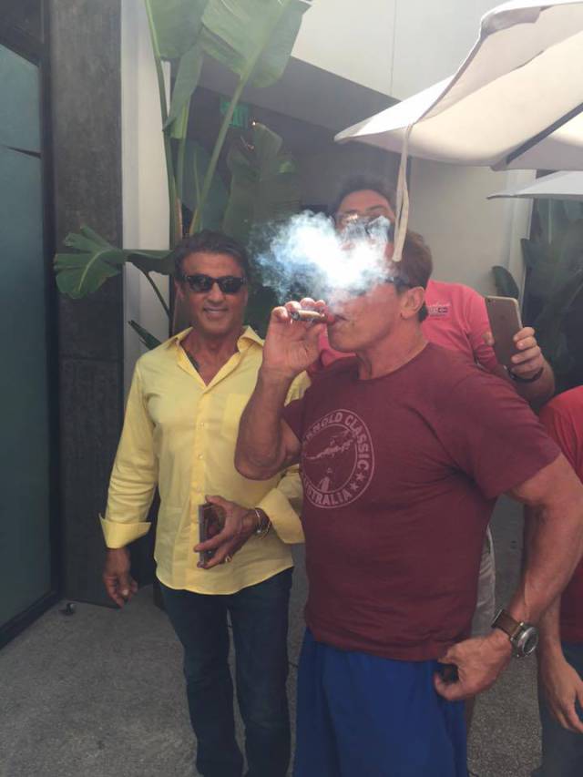 Celebrity Photo Gets Ruined by an Old Dude Smoking a Cigar