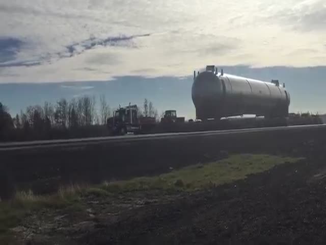 Trucks Haul a Tank Weighing 2.08 Million Pounds Down a Roadway in Alberta