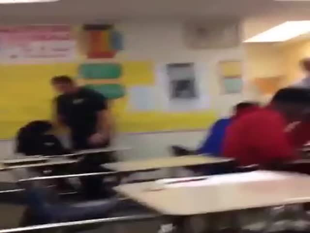 Police Officer Aggressively Assaults a Female Student