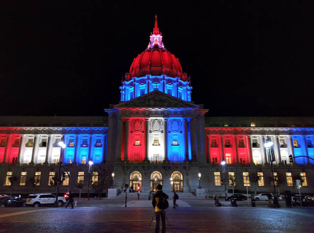 World Landmarks Light Up in Red, White and Blue in Support of France