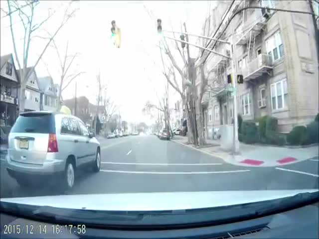 Kid Tries to Play Games in the Traffic with a Driver on the Road and Gets Taught a Hard Lesson