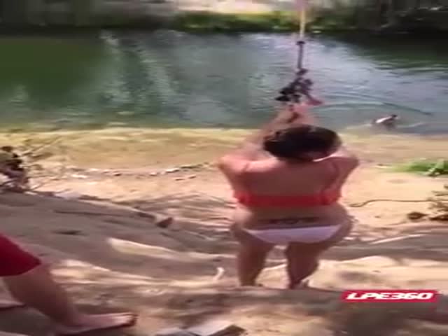 Bikini Clad Girl Loses to a Rope Swing