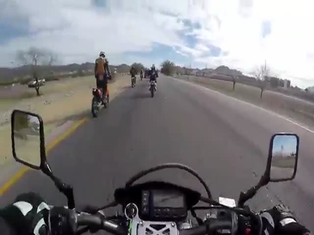 Some Angry Texas Dudes Threaten a Biker with a Gun