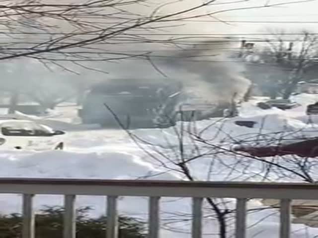A Garbage Truck Explodes in a Quiet Neighborhood and an Onlooker Catches It All on Camera