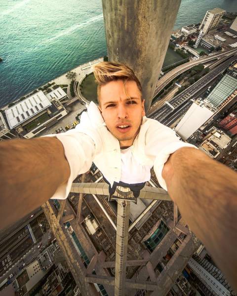 Russian Daredevil Captures Insane And Vertigo-Inducing Cityscapes From High Above The Ground