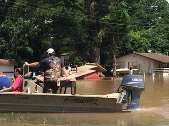 Father And Son Teamed Up To Rescue Abandoned Animals From Flood Waters In Texas