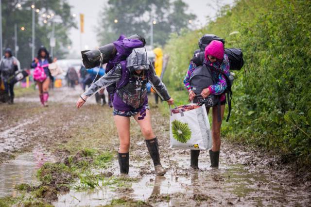 Heavy Rains Turned Glastonbury Site Into A Mudbath Creating A Chaos And A Headache For Festival Organizers Heavy Rains Turned Glastonbury Site Into A Mudbath Creating A Chaos And A Headache For Festival Organizers