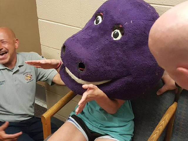 Girl Gets Stuck In The Head Of Barney The Purple Dinosaur