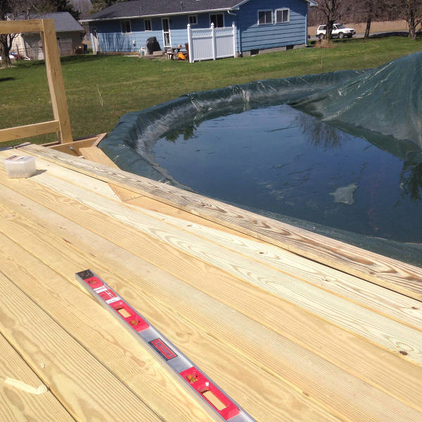 Guy Builds A Cool Deck For His Above Ground Pool