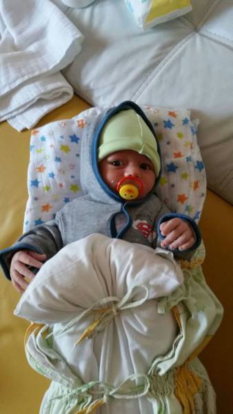 Wives Share Photos Of Their Other Husbands fails Failing Miserably At Dressing Their Babies