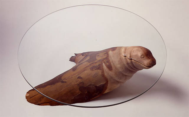 Unique Coffee Tables That Give An Illusion Of Animals Plunging In And Out Of The Glass