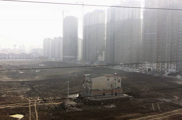 Chinese “Nail Houses” That Stay In The Way Of Progress
