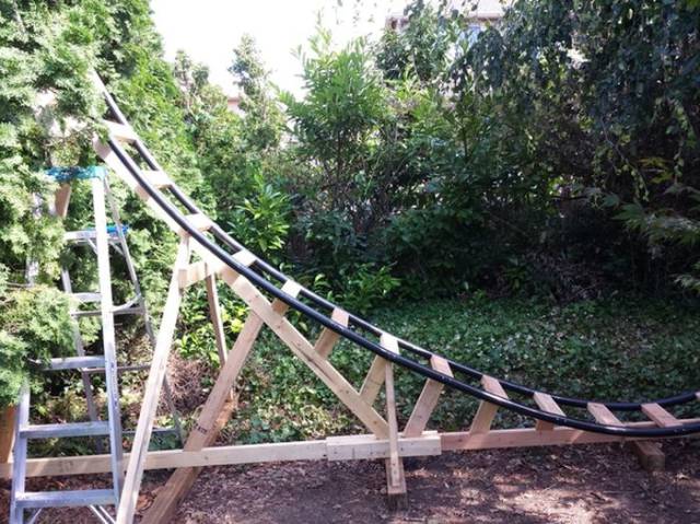 Dad Builds His Kids A Mini Roller Coaster In The Back Yard