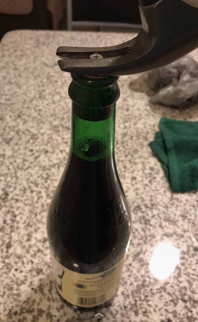 This Woman Opened Her Bottle Of Wine Using A Neat Trick