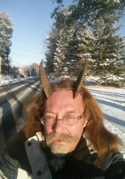 Pagan Priest Wears Horns For His Driving License Photo